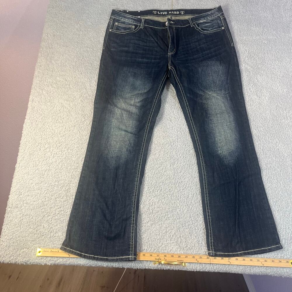 Live hard dark wash boot cut jeans size 2/4 (26) bedazzled rear pockets women’s